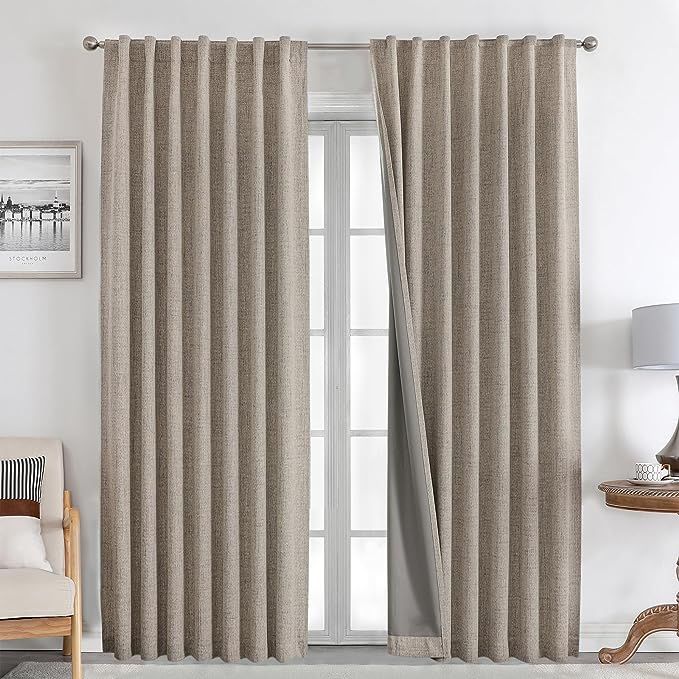 Layered sheer and blackout curtain detail